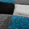 Tapis design moderne Motifs géométriques Contours découpés Voir les images du produit 7