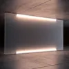 A modern, minimalist display of a translucent rectangular panel with integrated LED lighting, set against a textured concrete floor and ceiling. Produktbild-Vorschau