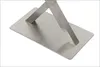 A close-up view of a brushed stainless steel table base with two angled legs. Podgląd zdjęcia produktu