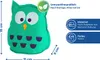 A teal owl-shaped pillow with purple spots and white eyes, next to measurement indicators and product information. Produktbild-Vorschau