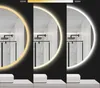 A round LED mirror is shown with three different lighting color temperatures: warm yellow, neutral white, and cool white. Podgląd zdjęcia produktu