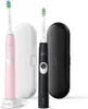 Two electric toothbrushes with their cases. Voir les images du produit