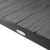 A close-up view of a table's surface and edge, showing the material and a brand logo. Náhľad obrázku produktu