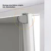 A close-up view of a roller blind mounting bracket attached to a window frame. Produktbild-Vorschau