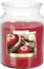 A red scented candle in a glass jar with a label showing apples and cinnamon sticks. Produktbild-Vorschau