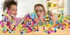 A child and an adult are playing with magnetic building blocks on a wooden table. Náhled obrázku produktu
