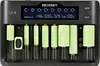 A VOLTCRAFT CC-8 battery charger with various types of batteries inserted. Produktbild-Vorschau