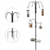 A black metal bird feeding station with multiple feeders and dishes. Voir les images du produit