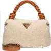 A beige fuzzy handbag with brown leather handles and strap, featuring a gold Guess logo. Produktbild-Vorschau