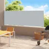 A patio scene with a retractable side awning, a table and chairs, and a grill. Voir les images du produit