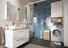 A modern bathroom with a vanity, sink, shower, and washing machine. Produktbild-Vorschau