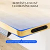 Close-up of a desk edge with cable management clips. Náhled obrázku produktu