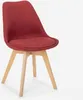 A red fabric chair with wooden legs on a white background. Produktbild-Vorschau