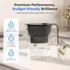 A water filter pitcher on a kitchen counter with a glass of water. Náhled obrázku produktu