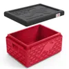 A red thermobox with a black lid, both featuring embossed kangaroo designs. Produktbild-Vorschau