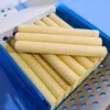 A close-up view of natural collagen casings arranged in a blue tray. Náhled obrázku produktu