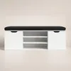 A white shoe cabinet with a black upholstered seat on top, set against a light gray background. Náhľad obrázku produktu