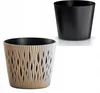 Two plant pots, one beige with a decorative pattern and one black, are shown against a white background. Anteprima dell’immagine prodotto