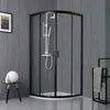 A modern bathroom with a black-framed glass shower enclosure. Produktbild-Vorschau