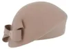 Fiebig schicker asymmetrischer Pillbox-Filzhut mit Schleife in beige