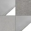 A collage of four close-up images showing different textures and edges of a gray blanket. Produktbild-Vorschau