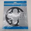 A Shimano chainring is shown in its original packaging. Náhľad obrázku produktu