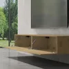 A modern floating TV stand with one cabinet door open, showing interior storage, set against a minimalist wall with a large window overlooking greenery. Anteprima dell’immagine prodotto