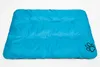 A blue dog mat with a paw print logo in the corner, on a white background. Produktbild-Vorschau