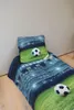 A bed with soccer-themed bedding and a pillow, set against a plain wall. Náhľad obrázku produktu