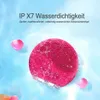 Tiefrosa Silikon-Gesichtsreinigungsbürste mit strukturierter Oberfläche, umgeben von Wasser und Blasen Anteprima dell’immagine prodotto