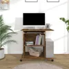 A computer desk with a monitor, books, and a computer tower. Anteprima dell’immagine prodotto