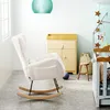 A nursery room with a rocking chair, changing table, and crib. Produktbild-Vorschau