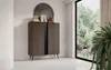 A modern living room with a wooden cabinet and a large window overlooking a lush green forest. Produktbild-Vorschau