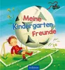 A child playing soccer in front of a large soccer ball with text. Produktbild-Vorschau