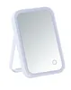 A white LED makeup mirror with a stand is shown against a white background. Produktbild-Vorschau