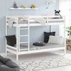 A child's bedroom with a white bunk bed, bedding, pillows, and decorative items on a shelf. Produktbild-Vorschau