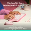 A person's hands are shown typing on a pink keyboard and using a pink mouse, with a pink mug and pink scissors on the desk. Náhľad obrázku produktu