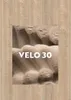 A close-up view of a textured fabric with the text 'VELO 30' overlaid. Náhled obrázku produktu