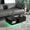 A modern living room scene with a grey sofa and a black coffee table with LED lighting. Anteprima dell’immagine prodotto