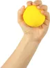 A hand holding a yellow stress ball. Voir les images du produit