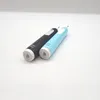 Two electric toothbrushes, one black and one blue, are placed diagonally on a white surface. Anteprima dell’immagine prodotto