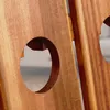 Close-up of two wooden panels with circular cutouts, showing the grain of the wood. Produktbild-Vorschau