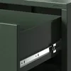 Close-up of an open drawer in a dark green metal cabinet. Podgląd zdjęcia produktu