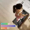 A woman is using a treadmill in a home or office setting, with a desk and computer in the background. Podgląd zdjęcia produktu