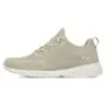 A side view of a single beige sneaker on a white background. Voir les images du produit