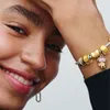 Clip-Charm mit Zirkoniasteinen, vergoldet, PANDORA Moments Produktbild-Vorschau 9