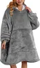 A woman wearing a grey oversized hoodie blanket. Náhľad obrázku produktu