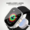A smartwatch with a protective case is shown connected to a wireless charger. Produktbild-Vorschau