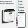 A programmable outlet thermostat is shown plugged into a wall socket, with a smartphone displaying its app interface next to it. Icons representing date, time, heating, and cooling are also visible. Produktbild-Vorschau