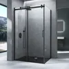 A modern bathroom with a sleek black framed glass shower enclosure. Produktbild-Vorschau